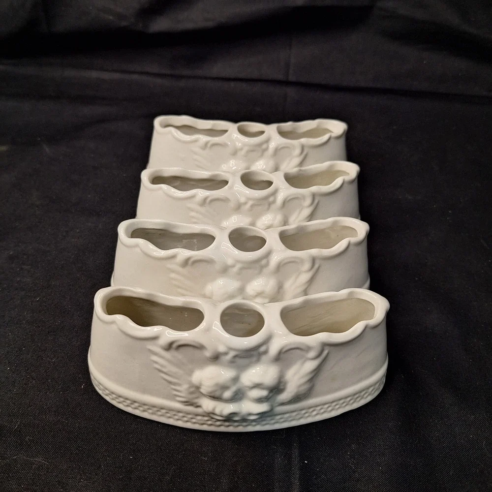 Set of 4 White Glazed‎ Dresden Porcelain Cherub Crescent Flower Candle Holders